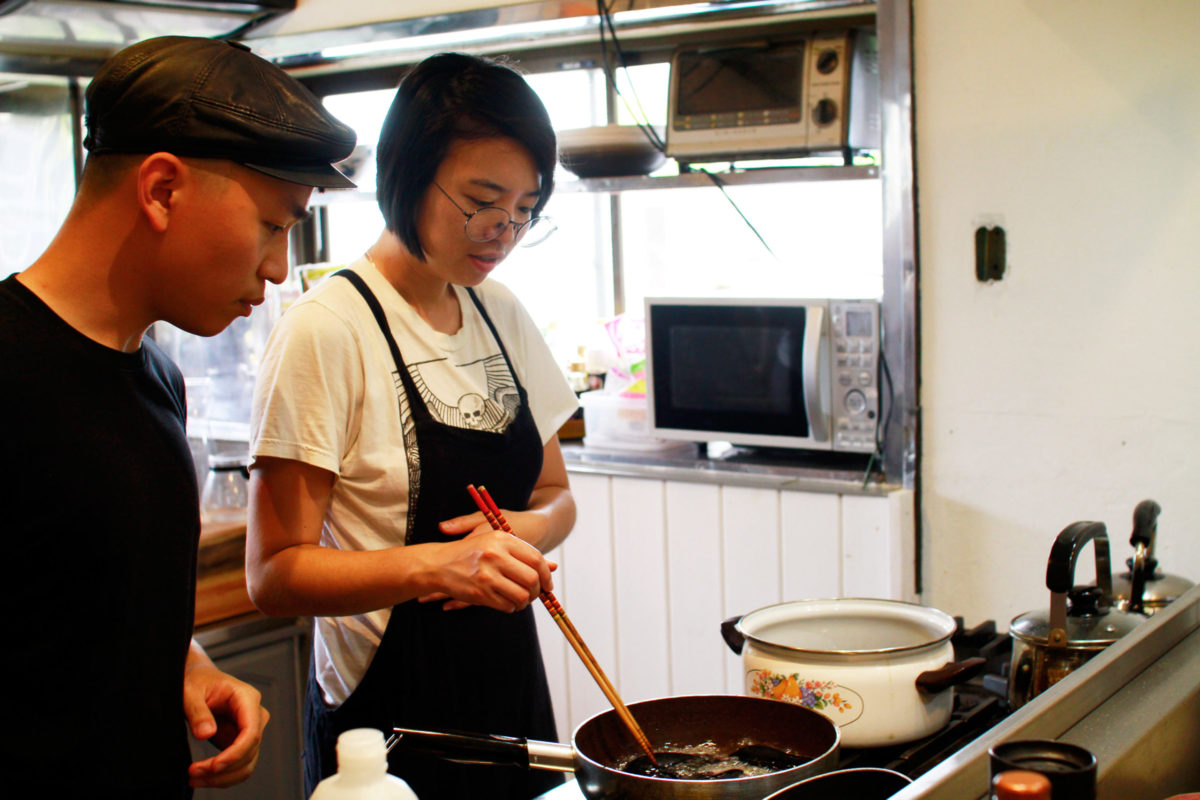 Frying Eggplant at Art residency Cooking workshop